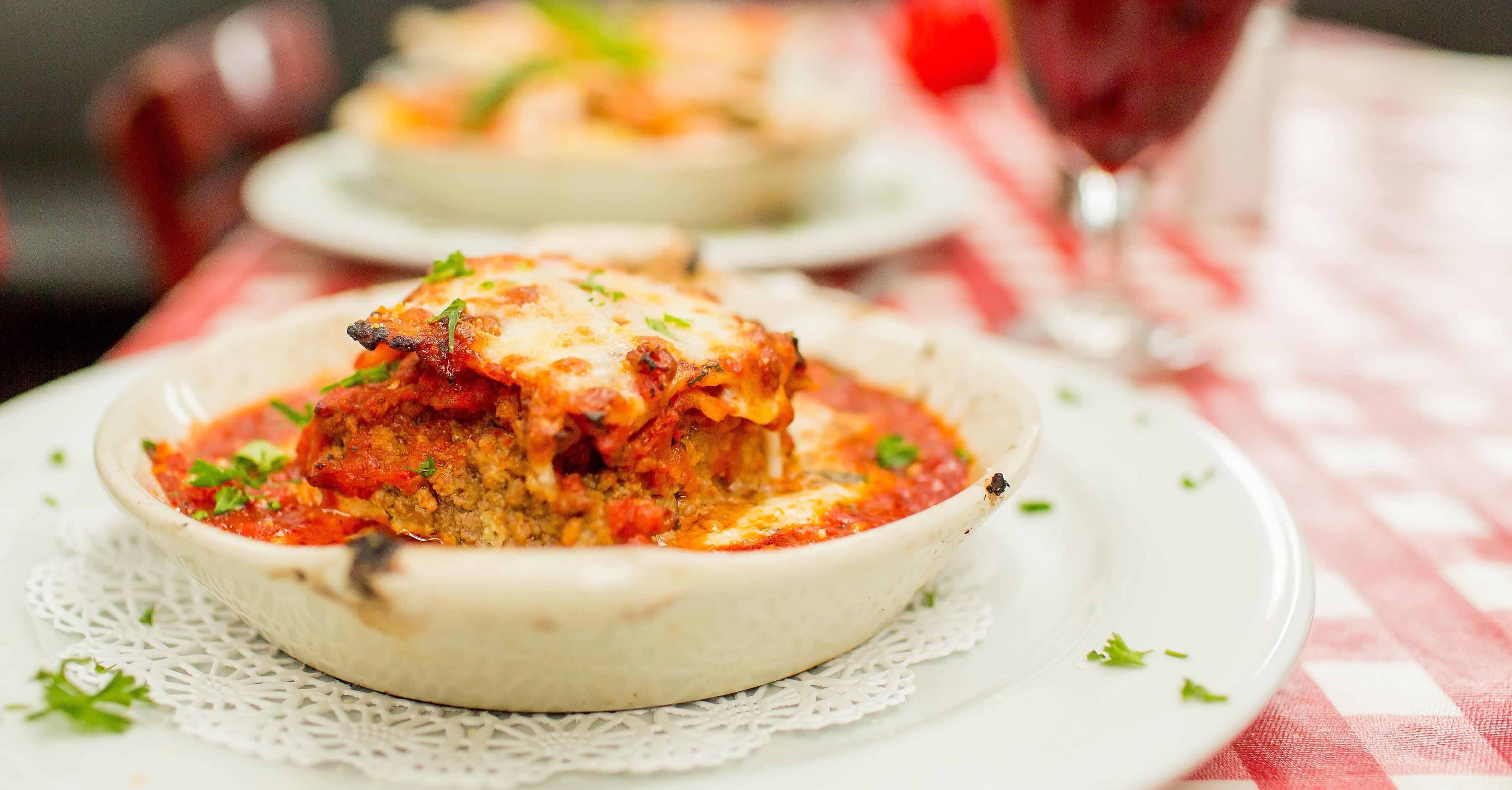 AshleyStrongPhotography_SonnysPizza&Pasta-136 Homemade Meat Lasagna. Melted cheese and wine.